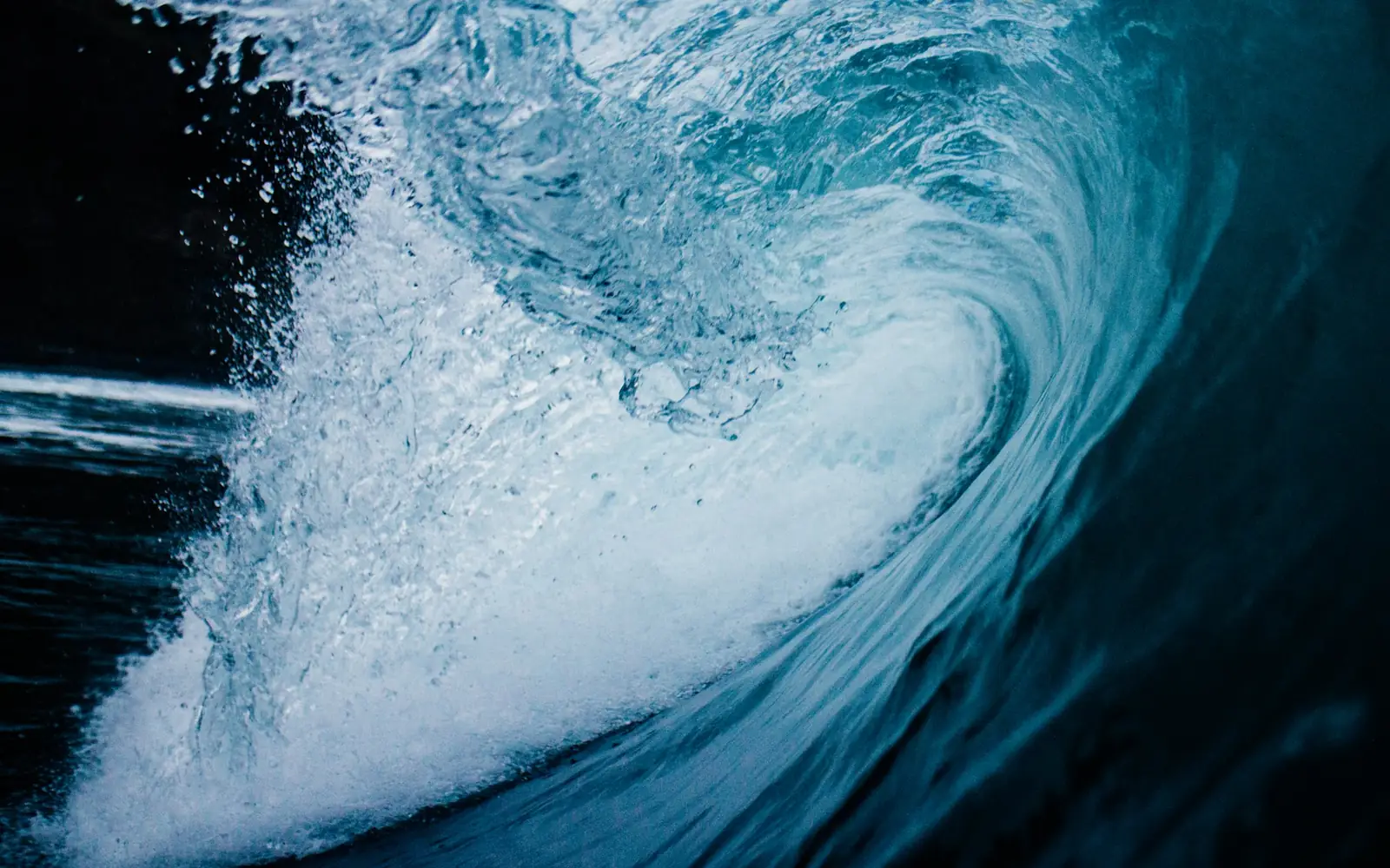 Wave tunnelling over dark water