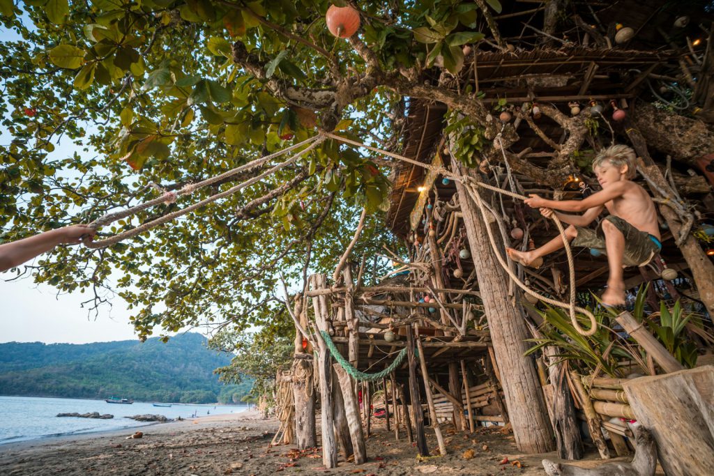 Stilt hut above the calm water of a sheltered bay
